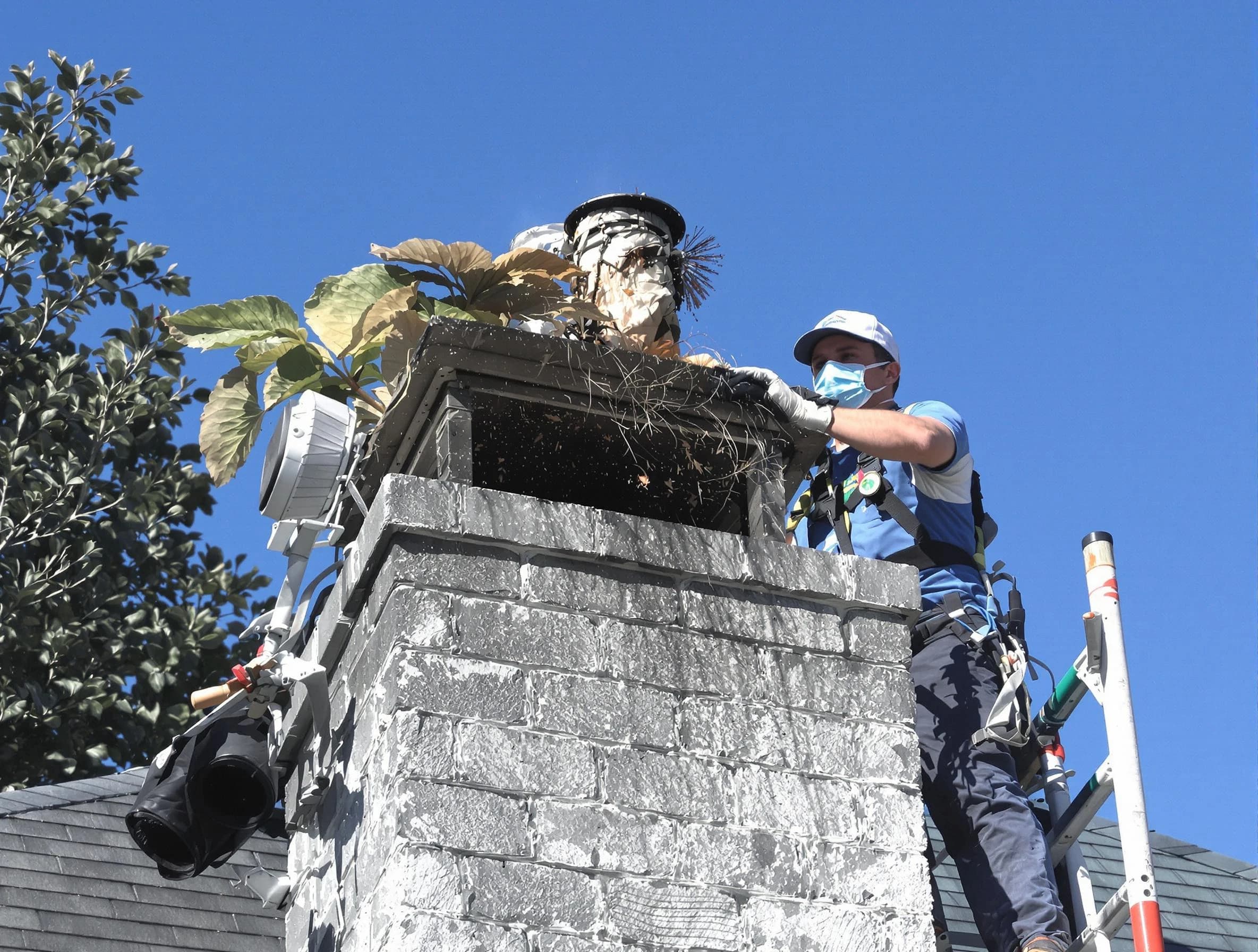 Stafford Chimney Sweep specialist performing chimney cleaning in Stafford, NJ